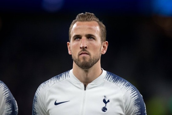Article image: https://image-service.onefootball.com/crop/face?h=810&image=https%3A%2F%2Ficdn.caughtoffside.com%2Fwp-content%2Fuploads%2F2021%2F07%2FHarry-Kane-THFC-tracksuit-image.jpg&q=25&w=1080