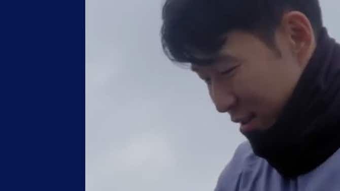 Preview image for Heung-min Son signs autographs before rainy training session