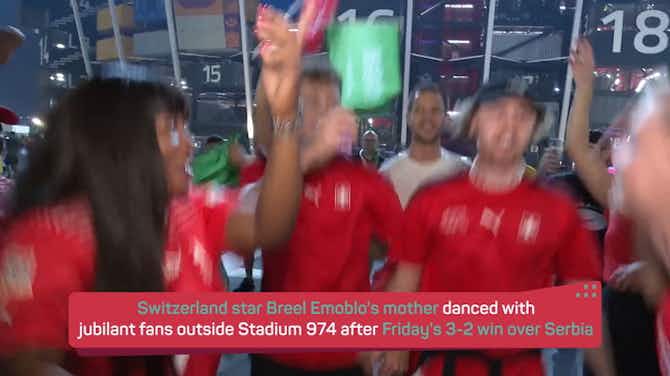 Pratinjau gambar untuk Embolo's mum celebrates with Swiss fans