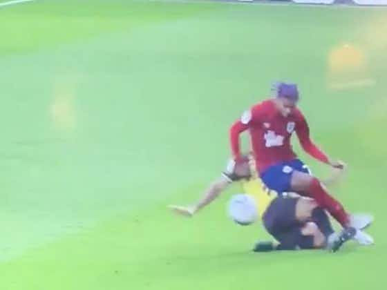Article image:Video: Troy Deeney somehow avoids red card after horror tackle on Huddersfield’s Juninho Bacuna