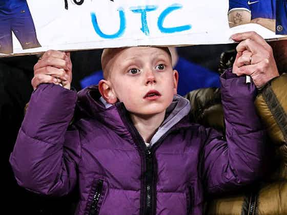 Article image:(Image): Young Chelsea fan holds up pitiful sign which sums up embarrassing performance