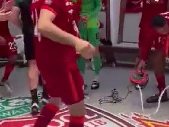 Article image:(Video) Liverpool fans will love watching Joel Matip tidying the Wembley dressing room as his teammates celebrate the FA Cup win
