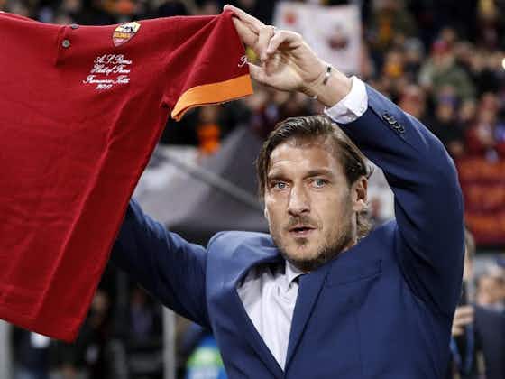 Article image:Brighton fans troll Roma legend Totti with unusual banner – picture