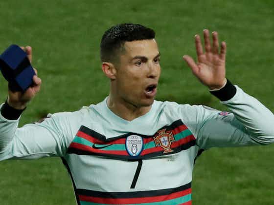 Article image:Ronaldo armband fetches over £50,000 for baby's treatment after Portugal captain's Belgrade walk-off