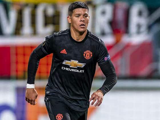Article image:Smalling and Rojo train separate from rest of Man Utd squad