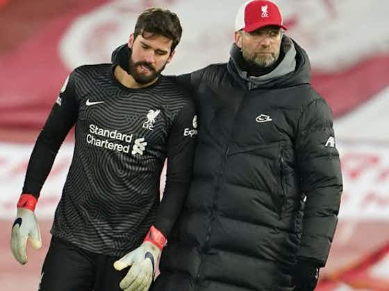 Article image:Liverpool fullback Robertson laughs off rumoured scrap with Alisson: Do I look like a boxer?