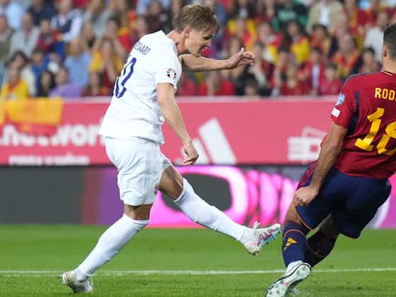 Article image:Martin Odegaard reacts to Rodri's gruesome tackle in Spain defeat