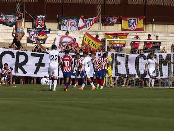 Article image:Atletico Madrid fans raise anti-Cristiano Ronaldo banner during friendly