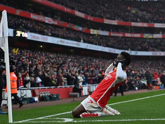 Article image:Bukayo Saka and Martin Odegaard fire Arsenal four points clear at top of Premier League
