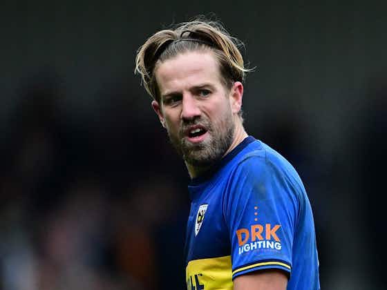 Article image:Harry Pell: AFC Wimbledon midfielder given one-match ban for kicking balls at MK Dons fans