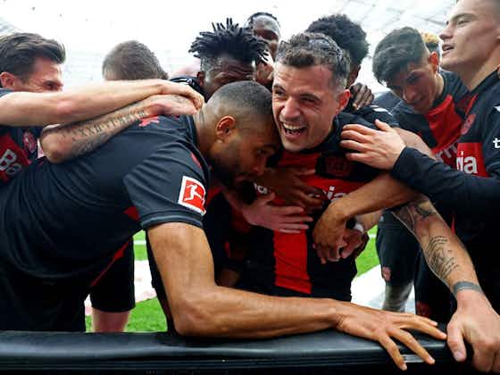 Article image:Granit Xhaka stunner and pitch-invasion pandemonium as Bayer Leverkusen win first-ever Bundesliga title
