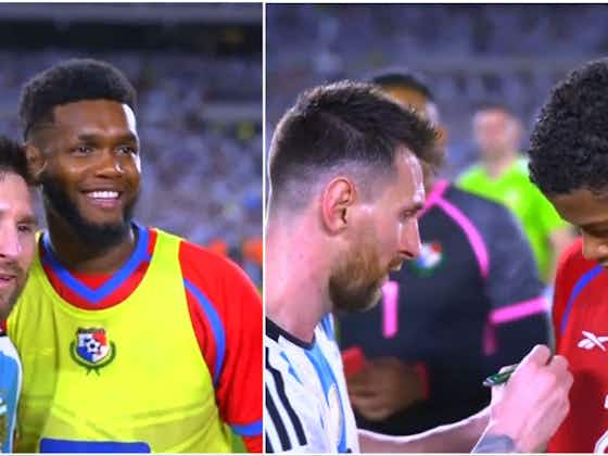 Article image:Lionel Messi takes pictures and signs shirts for Panama players after Argentina win