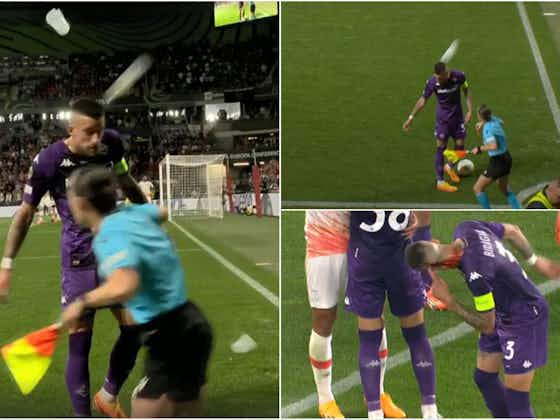 Article image:Fiorentina's Cristiano Biraghi hit by projectile thrown by West Ham fan