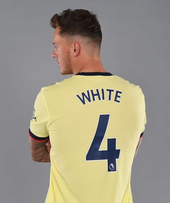 Article image:[Photos] Ben White poses with No.4 Arsenal shirt after completing £50m move