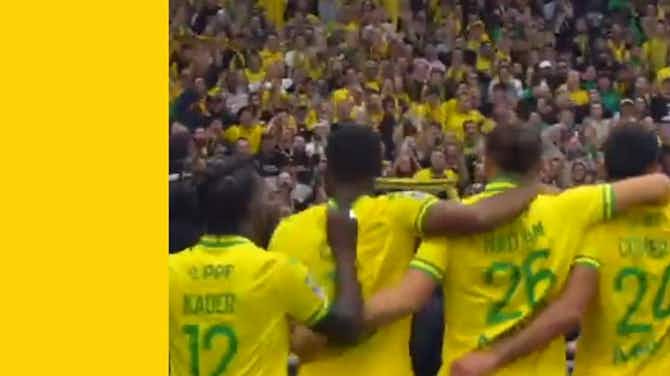 Preview image for Nantes players celebrate with fans after Montpellier win