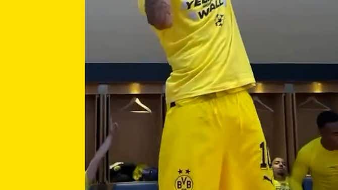 Preview image for Sancho leads Dortmund's looker room celebrations after reaching the UCL final