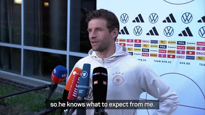 Preview image for 'That's rad' - Muller interview interrupted by Christmas music