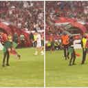 Preview image for Cristiano Ronaldo picked up by pitch invader during Portugal vs Bosnia