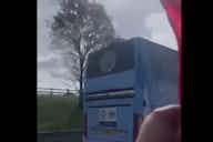 Preview image for (Video) Raucous Liverpool fans pass Manchester City team bus en route to Wembley