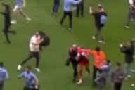 Preview image for (Video) Robin Olsen attacked by multiple Man City pitch invaders in damning footage