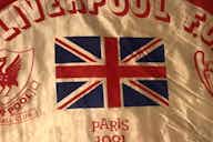 Preview image for (Image) Liverpool fan takes 40-year-old Paris flag back to France for another Champions League final against Real Madrid